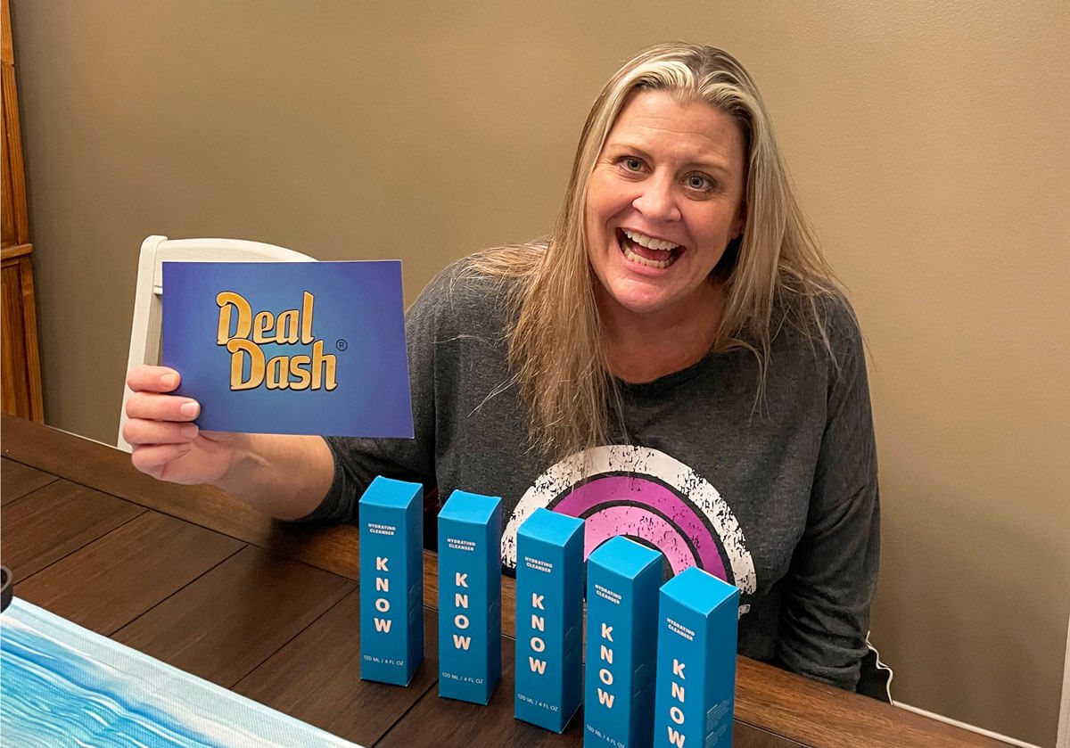 A member showing the skincare she won
